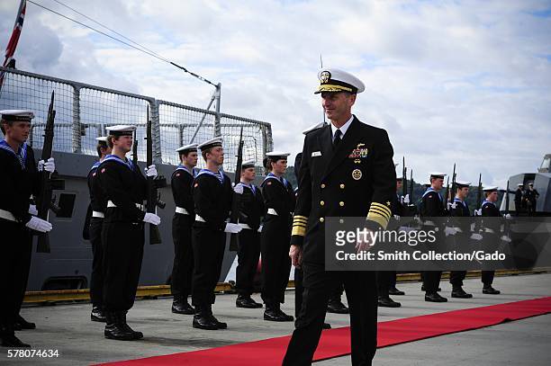 Chief of Naval Operations CNO Admiral Jonathan Greenert inspects the Royal Norwegian navy Honor Guard upon his arrival at Haakonsvern Naval Base...