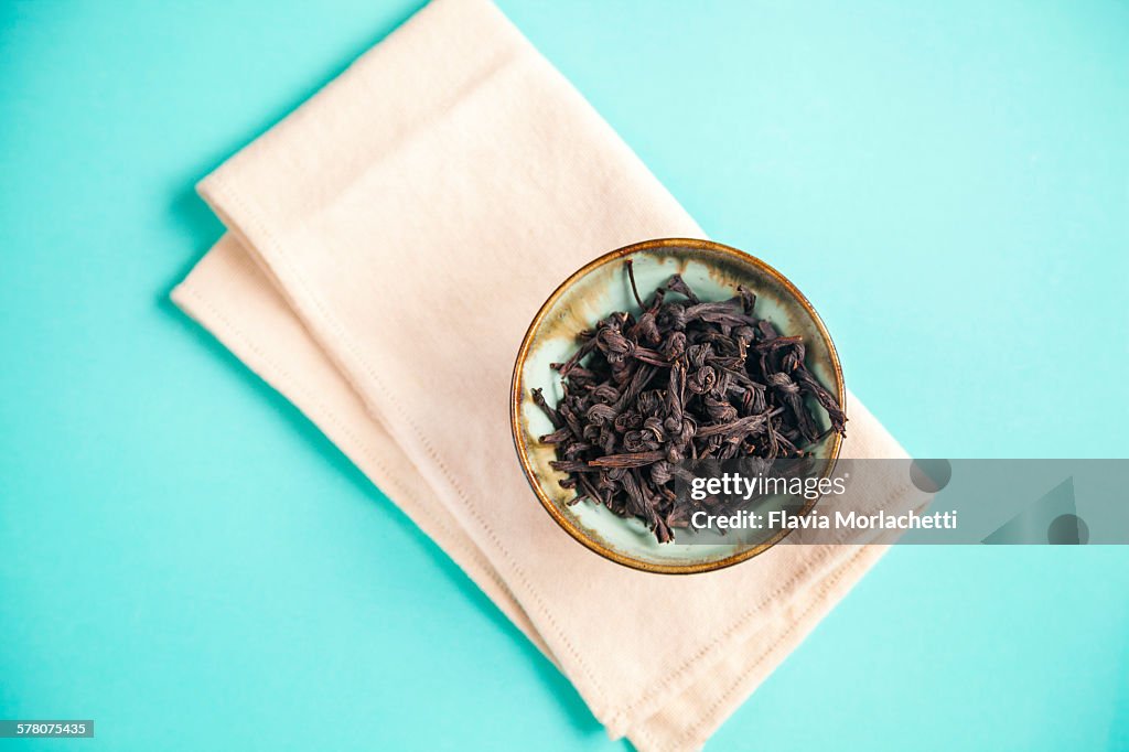 Knotted black tea leaves, artisanal variety