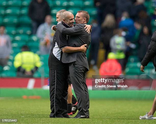 Manager of Celtic Brendan Rodgers hugs Manager of Lincoln Red Imps Julio Cesar Ribas at the end of the UEFA Champions League Second Qualifying Round:...