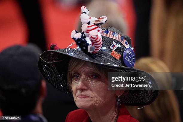 Delegate wears a hat with campaign memorabilia on the third day of the Republican National Convention on July 20, 2016 at the Quicken Loans Arena in...