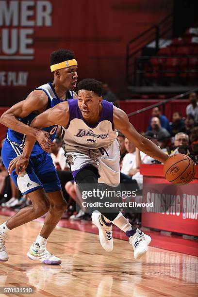 Anthony Brown of the Los Angeles Lakers drives to the basket against the Golden State Warriors during the 2016 NBA Las Vegas Summer League on July...