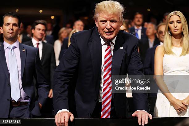 Republican presidential candidate Donald Trump speaks to delegates as Donald Trump Jr. And Ivanka Trump look on during the third day of the...