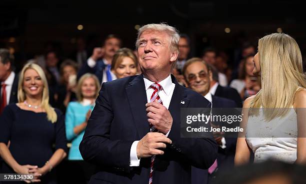 Republican presidential candidate Donald Trump and Ivanka Trump stand as Eric Trump delivers his speech during the third day of the Republican...