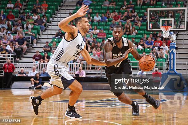 Ilja Gromovs of San Antonio Spurs drives to the basket against the Utah Jazz during the 2016 Utah Summer League at vivint.SmartHome Arena on July 4,...