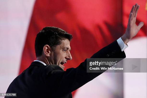 Speaker of the House Paul Ryan waves to the crowd as he walks on stage to introduce Republican Vice Presidential Candidate Mike Pence on the third...