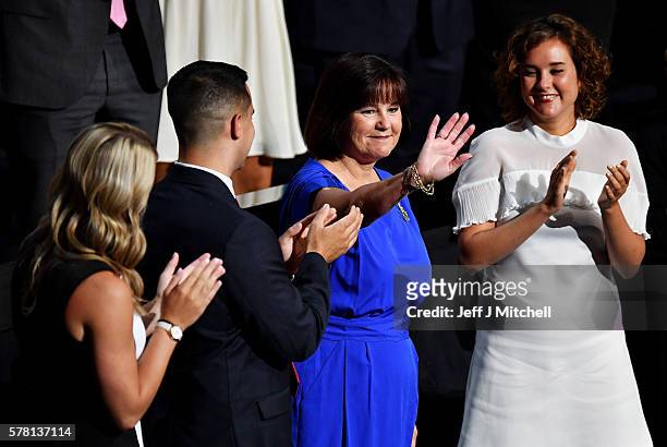 The wife of Republican vice presidential candidate Mike Pence, Karen Pence, waves to the crowd as Sarah Whiteside , son Michael Pence , and daughter...