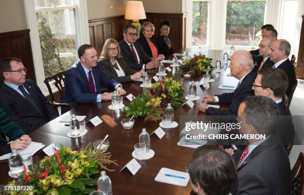 Vice President Joe Biden and New Zealand Prime Minister John Key speak during their bilateral meeting at Government House in Auckland on July 21,...