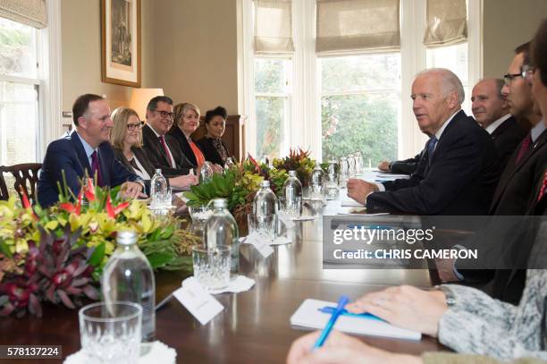 Vice President Joe Biden and New Zealand Prime Minister John Key speak during their bilateral meeting at Government House in Auckland on July 21,...