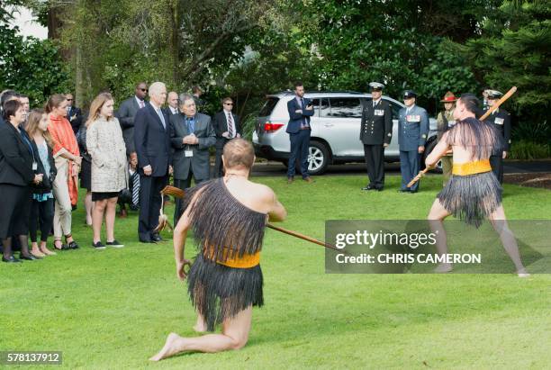 Vice President Joe Biden stands with Maori elder and government official Lewis Moeau during a traditional Maori welcome ceremony at Government House...