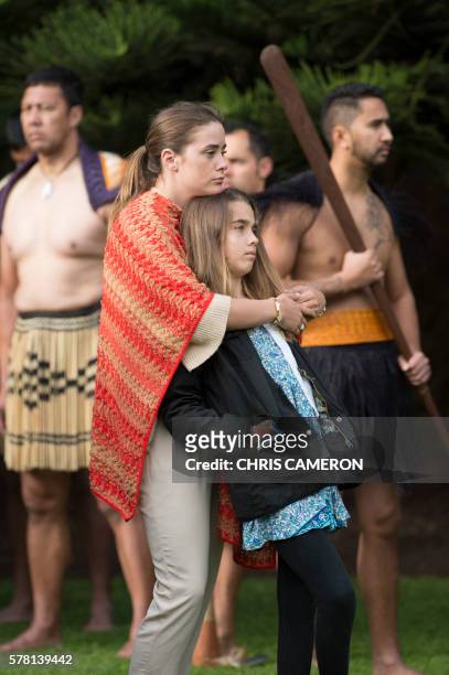 Vice President Joe Biden's granddaughters, 21-year-old Naomi Biden and 12-year-old Natalie Biden , look on as a guard of honour is presented during a...