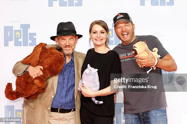 German actor Dietmar Baer, german comedian Martina Hill and german comedian Mario Barth attend the premiere of the film 'PETS' at CineStar on July...