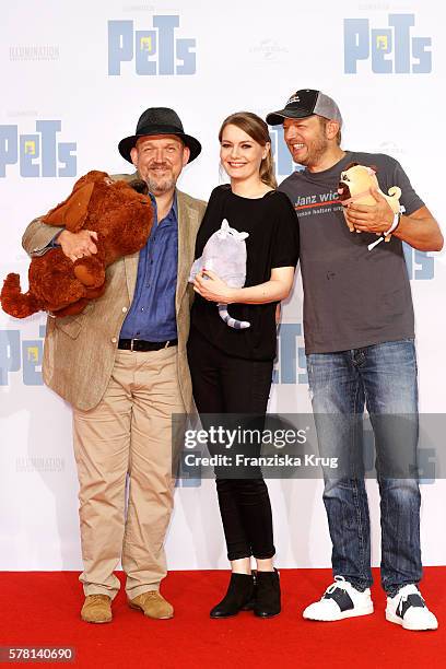 German actor Dietmar Baer, german comedian Martina Hill and german comedian Mario Barth attend the premiere of the film 'PETS' at CineStar on July...
