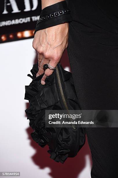 Actress Adrienne Janic, clutch detail, arrives at the opening of "Cabaret" at the Hollywood Pantages Theatre on July 20, 2016 in Hollywood,...