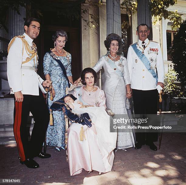 Group portrait of members of the Greek royal family at the christening of Princess Alexia of Greece and Denmark in 1965. From left to right: King...
