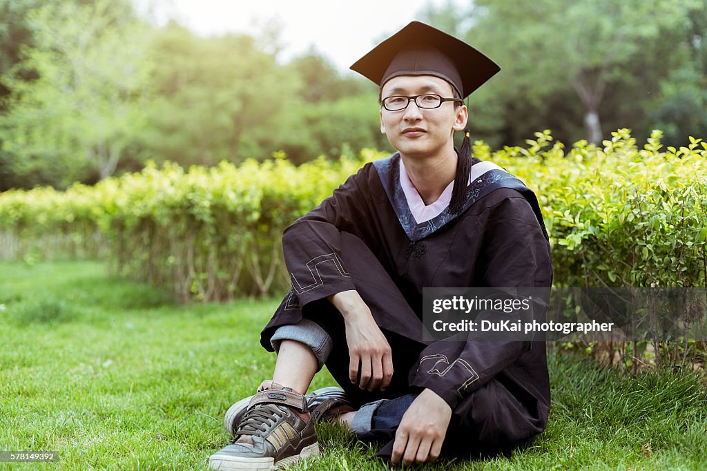 Chinese Spring Graduation Cap Chinese Student In Graduation Cap And Gown High-Res Stock Photo - Getty ...