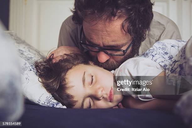 father and dother - good morning kiss images stock-fotos und bilder