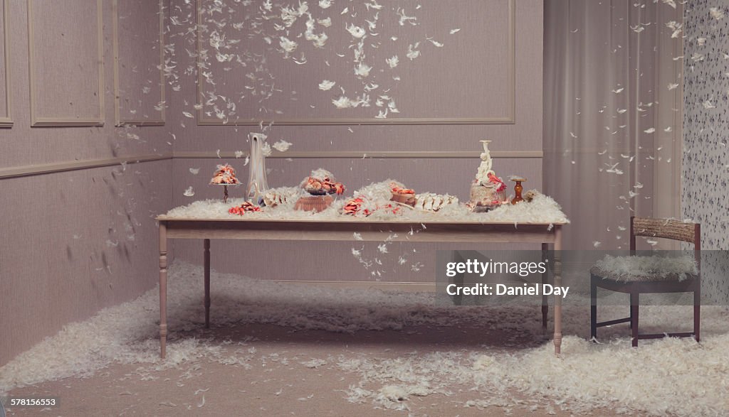 Table setting with feathers falling