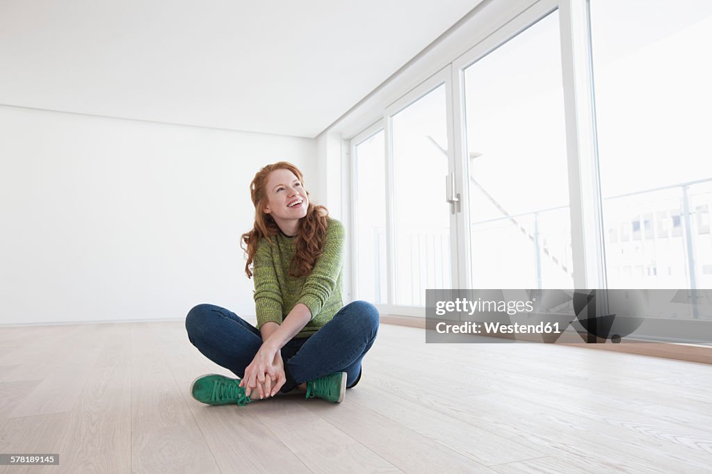 Young house-hunting woman viewing modern flat