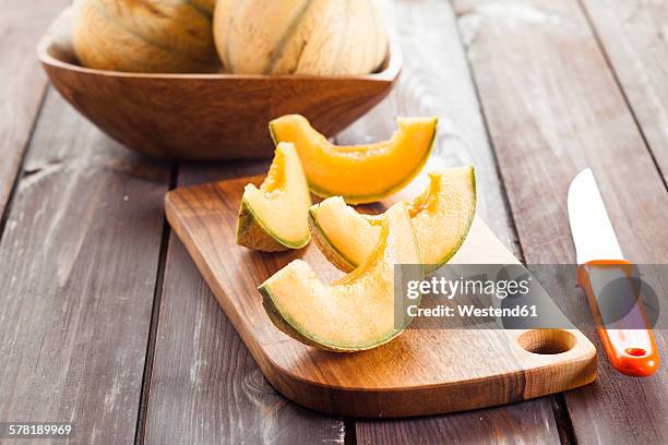 sliced and pitted charentais melon - rockmelon stock pictures, royalty-free photos & images