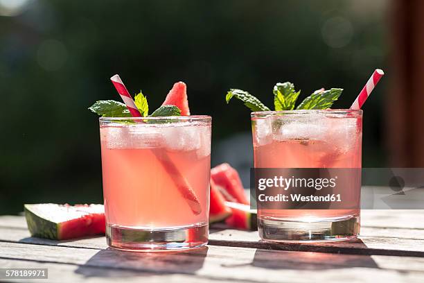 watermelon-hugo, mojito in glasses with drinking straw - mojito stock pictures, royalty-free photos & images