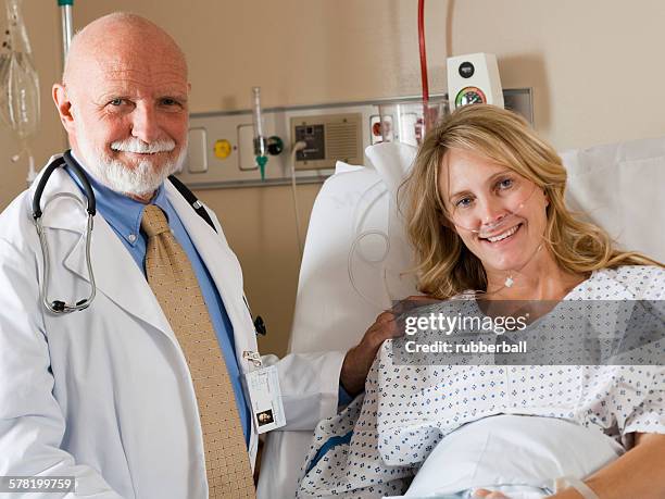 woman in hospital bed - iv pump stock pictures, royalty-free photos & images