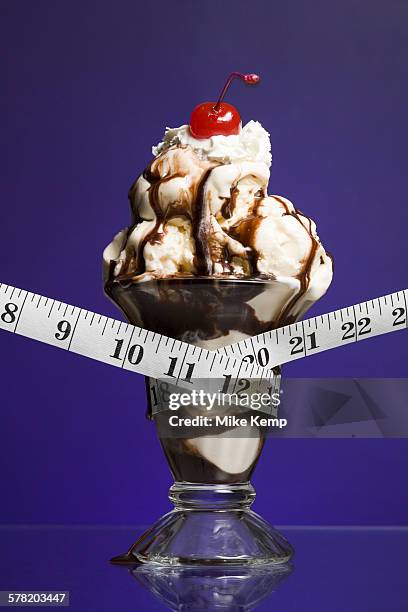 close-up of a tape measure around an ice-cream - un certain regard stock pictures, royalty-free photos & images