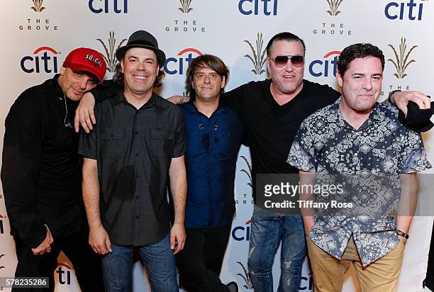Drummer Randy Cooke , bassist Paul De Lisle , keyboard player Michael Klooster and frontman Steve Harwell of the band Smash Mouth poses for photo at...
