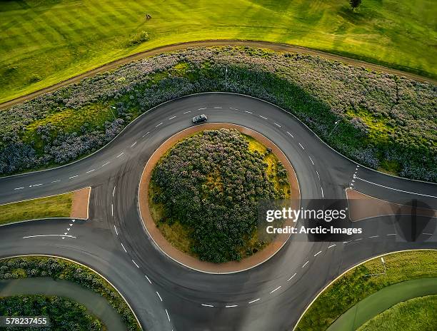 traffic circle next to golf course, reykjavik - roundabout stock pictures, royalty-free photos & images