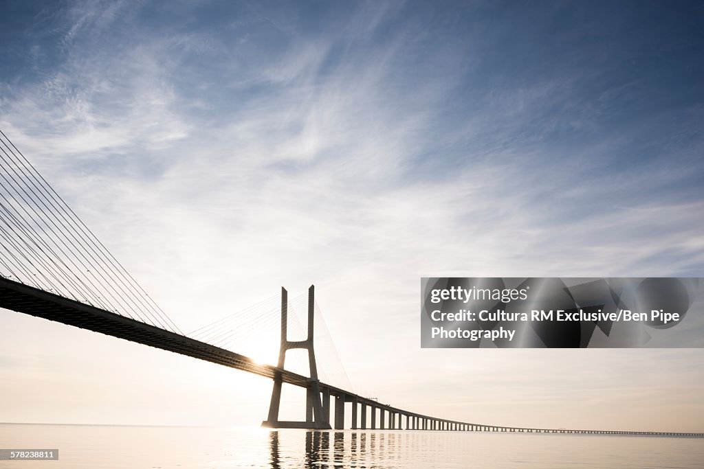 Vasco Da Gama Bridge against dramatic sky, Tagus River, Lisbon, Portugal