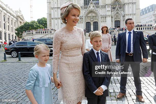 Queen Mathilde of Belgium, Prince Emmanuel and Princess Eleonore greet locals after the Te Deum mass at the Cathedral of St. Michael and St. Gudula...