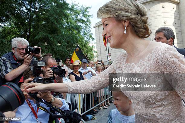 Queen Mathilde of Belgium greets locals after the Te Deum mass at the Cathedral of St. Michael and St. Gudula on July 21, 2016 in Brussels, Belgium.