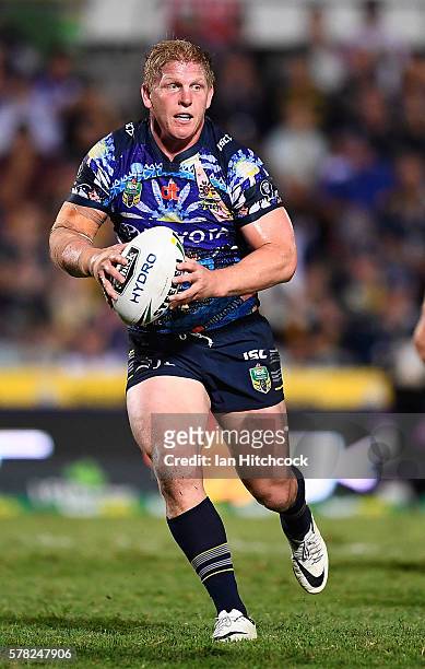 Ben Hannant of the Cowboys runs the ball during the round 20 NRL match between the North Queensland Cowboys and the Canterbury Bulldogs at 1300SMILES...