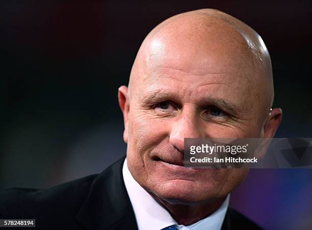 Television commentator and former player Peter Sterling looks on before during the round 20 NRL match between the North Queensland Cowboys and the...