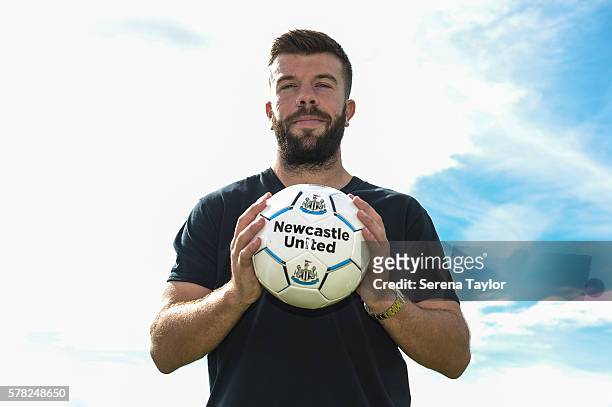 Grant Hanley poses for photographs holding a football at the Newcastle United Training Centre on July 21 in Newcastle upon Tyne, England.