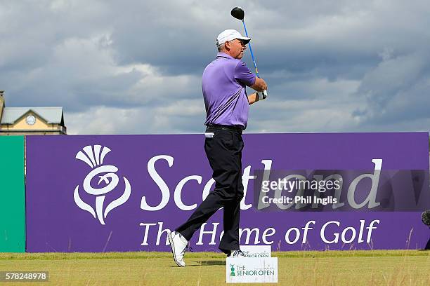 Mike Harwood of Australia in action during the first round of the Senior Open Championship played at Carnoustie Golf Club on July 21, 2016 in...