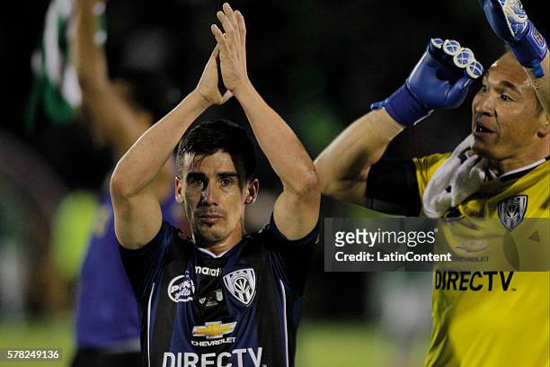 Mario Rizotto of Independiente del Valle greets fans after a first leg final match between Independiente del Valle and Atletico Nacional as part of...