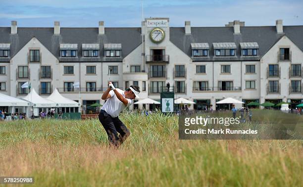 Jean Van De Velde of France second shot from deep rough at the 18th during the first day of The Senior Open Championship at Carnoustie Golf Club on...