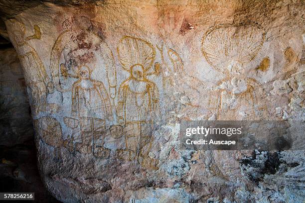 Aboriginal rock paintings of figures with enormous headdresses or hats, on Bigge Island, about 20 km from the mainland at Cape Pond. Bonaparte...
