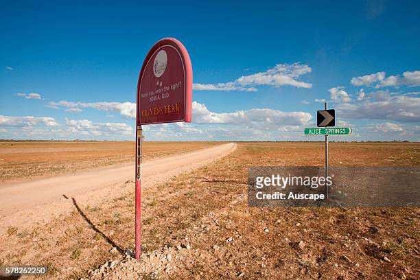 Gibber plain and Cravens Peak station sign. Cravens Peak Reserve, central west Queensland, Simpson Desert, Australia.