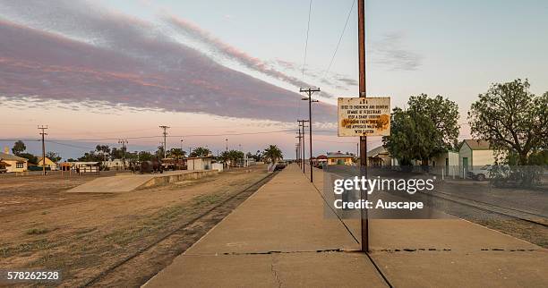 Dawn over the disused rail lines at Marree, rendered obsolete by the re-routing of the Ghan line between Adelaide to Alice Springs in 1980 and the...