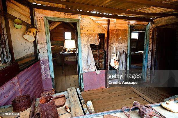 Interior of a deserted miner's cottage in ghost town, Gwalia was a gold-mining town, Underground mining began in 1897 at the Sons of Gwalia mine that...