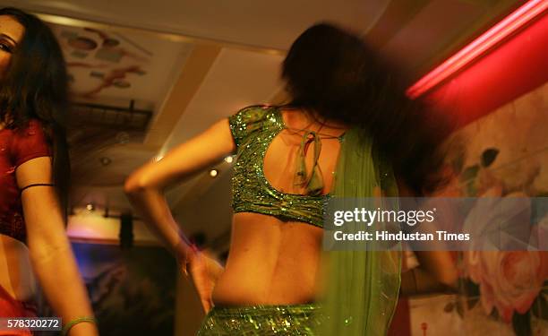 Bar girls dancing at a dance bar in Dadar.