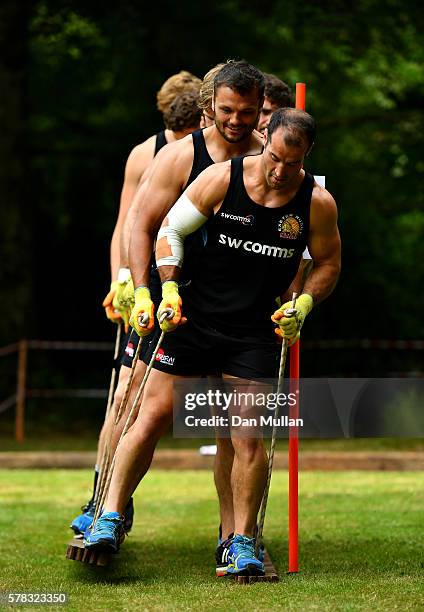 Haydn Thomas of Exeter Chiefs leads his team through an obstacle during a team building exercise at River Dart Country Park on July 21, 2016 in...