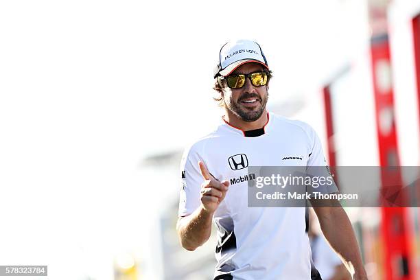 Fernando Alonso of Spain and McLaren Honda walks in the Paddock during previews ahead of the Formula One Grand Prix of Hungary at Hungaroring on July...