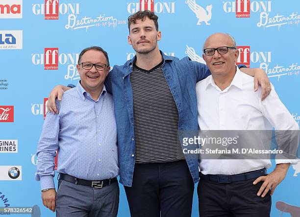 Actor Sam Claflin, President Pietro Rinaldi with Artistic Director Claudio Gubitosi attend the Giffoni Film Festival Day 7 blue photocall on July 21,...