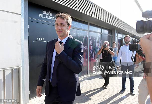 Spanish coach Julen Lopetegui leaves after attending a press conference following his appointment as new manager of the Spanish national football...