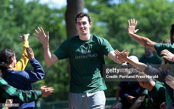 Jake Cohen of the Greek basketball team Aris Thessaloniki is greeted by campers at Seeds of Peace in Otisfield during the 14th Annual Play for Peace...
