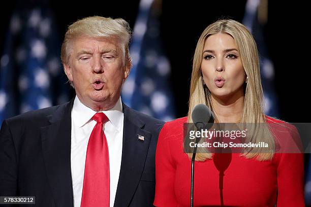 Republican presidential candidate Donald Trump and his daughter Ivanka Trump test the teleprompters and microphones on stage before the start of the...