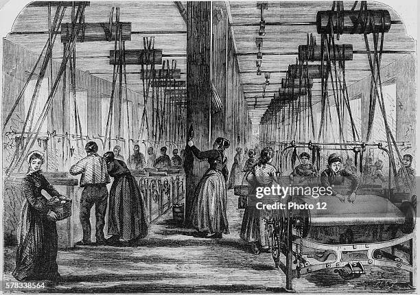 Women working in a textile mill in the Vosges region . Engraving from the 19th century, Private collection.