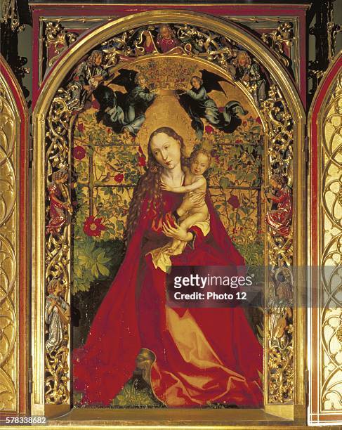 Martin Schongauer French school. Virgin of the Rose Garden Vierge au buisson de roses, 1473. Oil and gold leaf on wood panels . Colmar, Church of the...